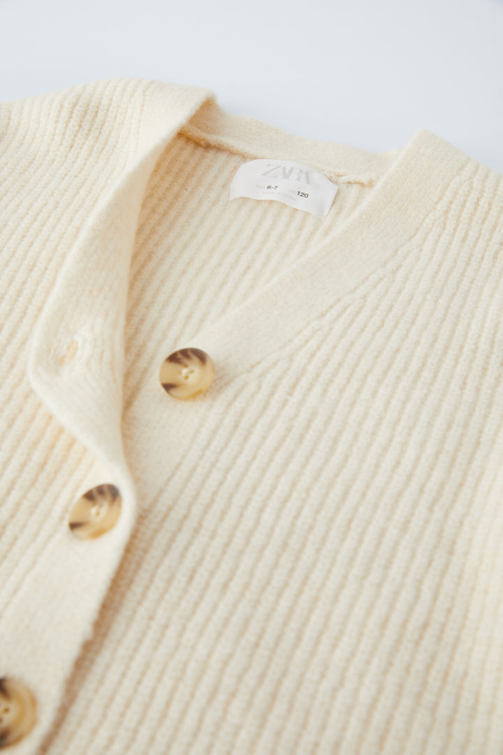 Veste longue demi-cardigan