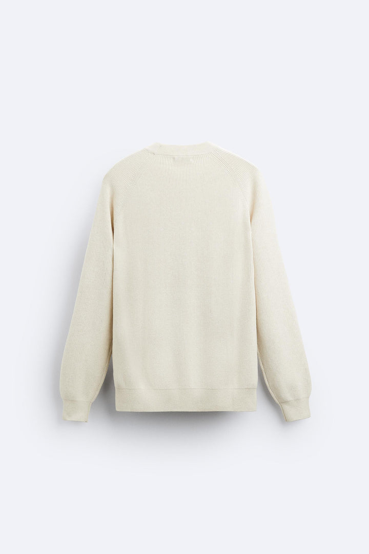 Pull maille perlée manches longues