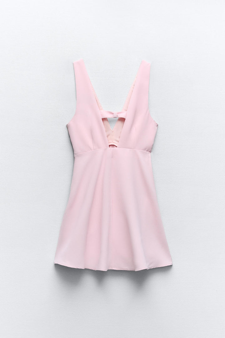 Robe chasuble détail bijou