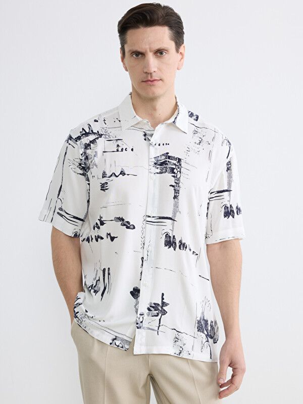 Moudda LC Waikiki - Chemise imprimée manches courtes en tissu pour Homme couleur Bleu imprimé - Tunisie 1
