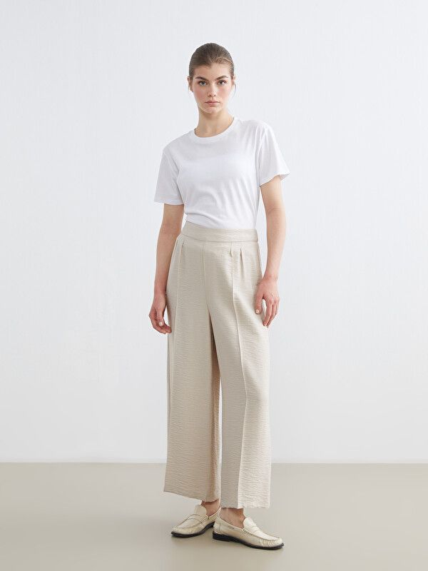 Moudda LC Waikiki - Pantalon fin en tissu pour Femme couleur Beige - Tunisie 1