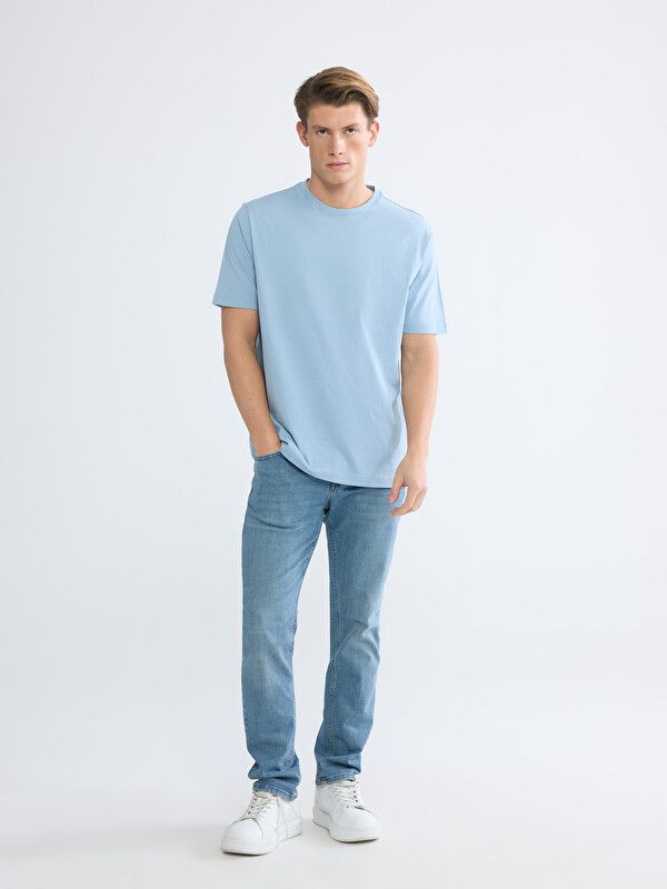 Moudda LC Waikiki - T-shirt basique col rond manches courtes en jersey pour Homme couleur  Bleu clair - Tunisie 2