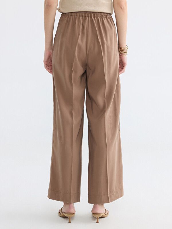 Moudda LC Waikiki - Pantalon fin en tissu pour Femme couleur Marron clair - Tunisie 4