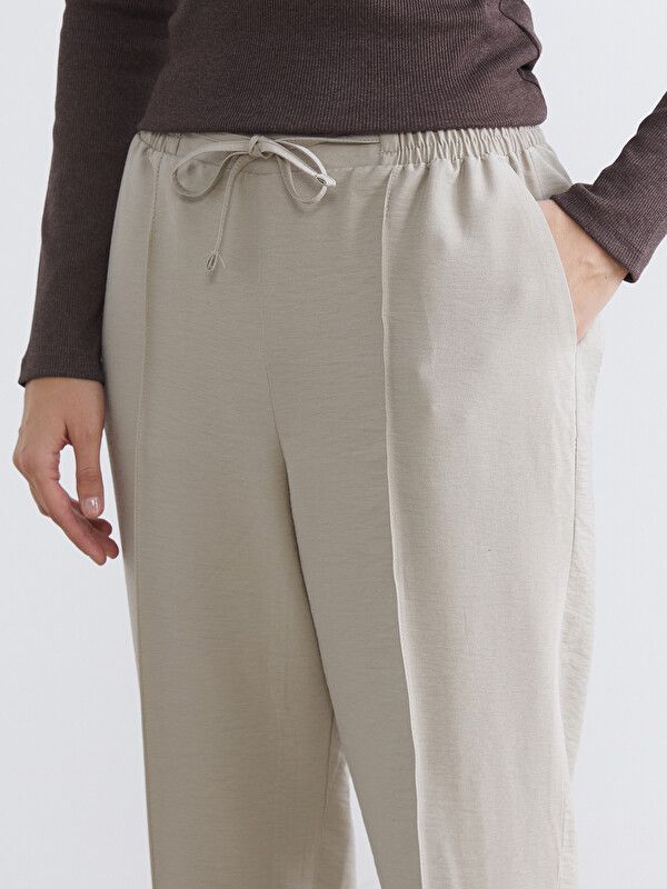 Moudda LC Waikiki - Pantalon fin en tissu pour Femme couleur Beige - Tunisie 3