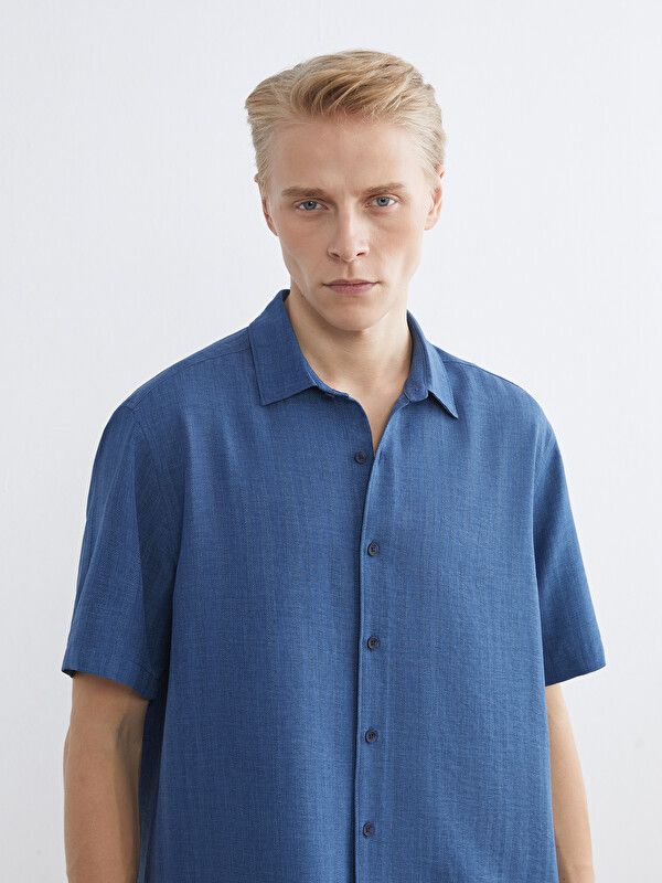Moudda LC Waikiki - Chemise manches courtes en tissu pour Homme couleur Bleu indigo - Tunisie 1