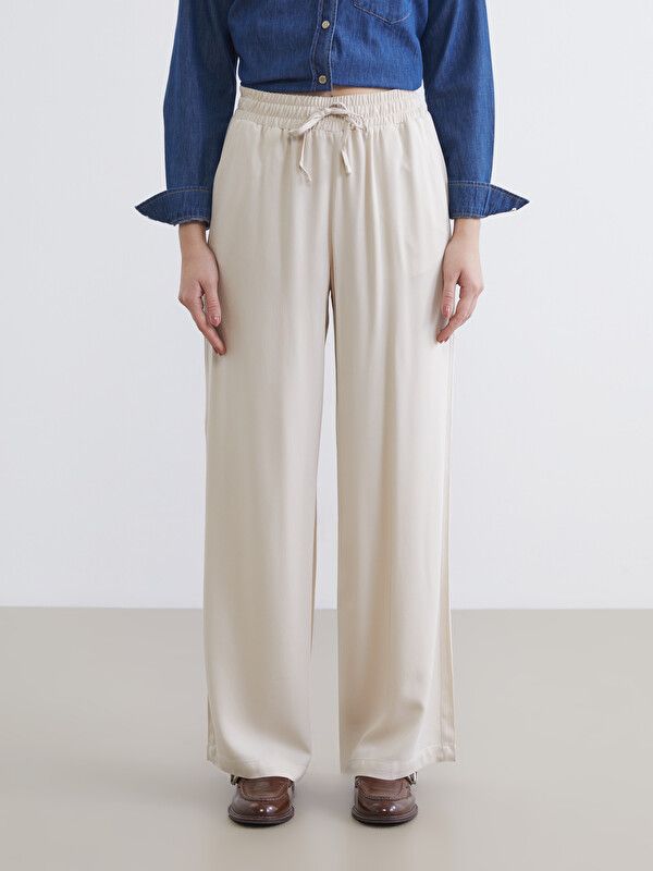 Moudda LC Waikiki - Pantalon fin en tissu pour Femme couleur Beige clair - Tunisie 2