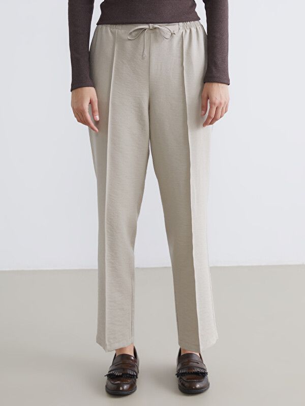 Moudda LC Waikiki - Pantalon fin en tissu pour Femme couleur Beige - Tunisie 2