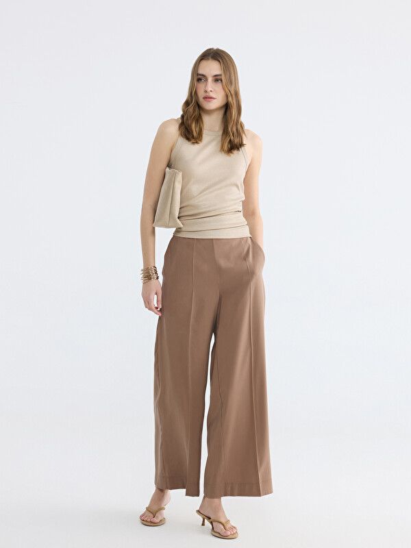 Moudda LC Waikiki - Pantalon fin en tissu pour Femme couleur Marron clair - Tunisie 1