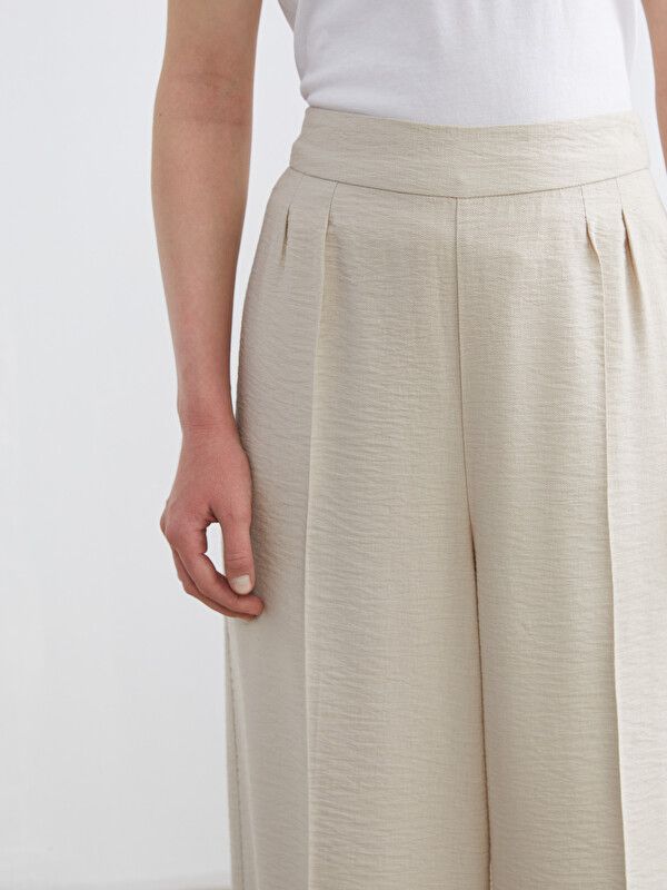 Moudda LC Waikiki - Pantalon fin en tissu pour Femme couleur Beige - Tunisie 3