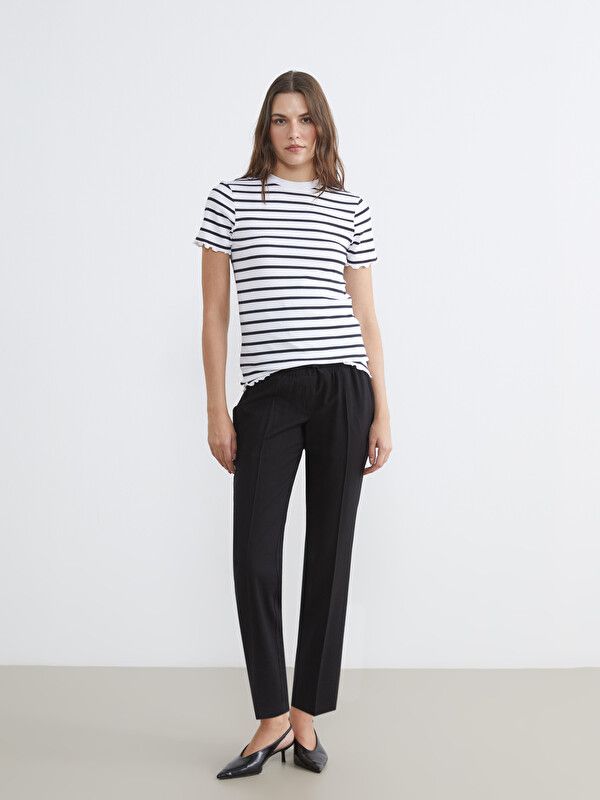 Moudda LC Waikiki - Blouse maternité en jersey manches courtes pour Femme couleur Noir rayé - Tunisie 2