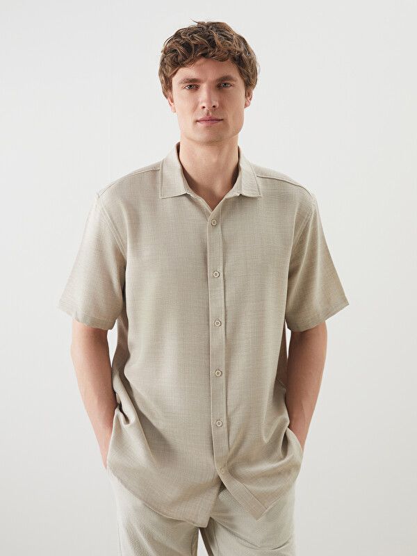Moudda LC Waikiki - Chemise manches courtes en tissu pour Homme couleur Gris pierre - Tunisie 1