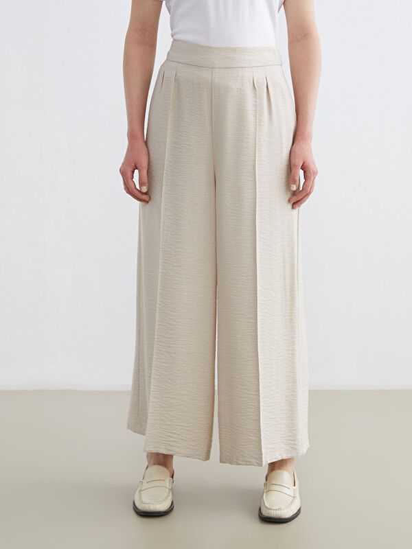 Moudda LC Waikiki - Pantalon fin en tissu pour Femme couleur Beige - Tunisie 2